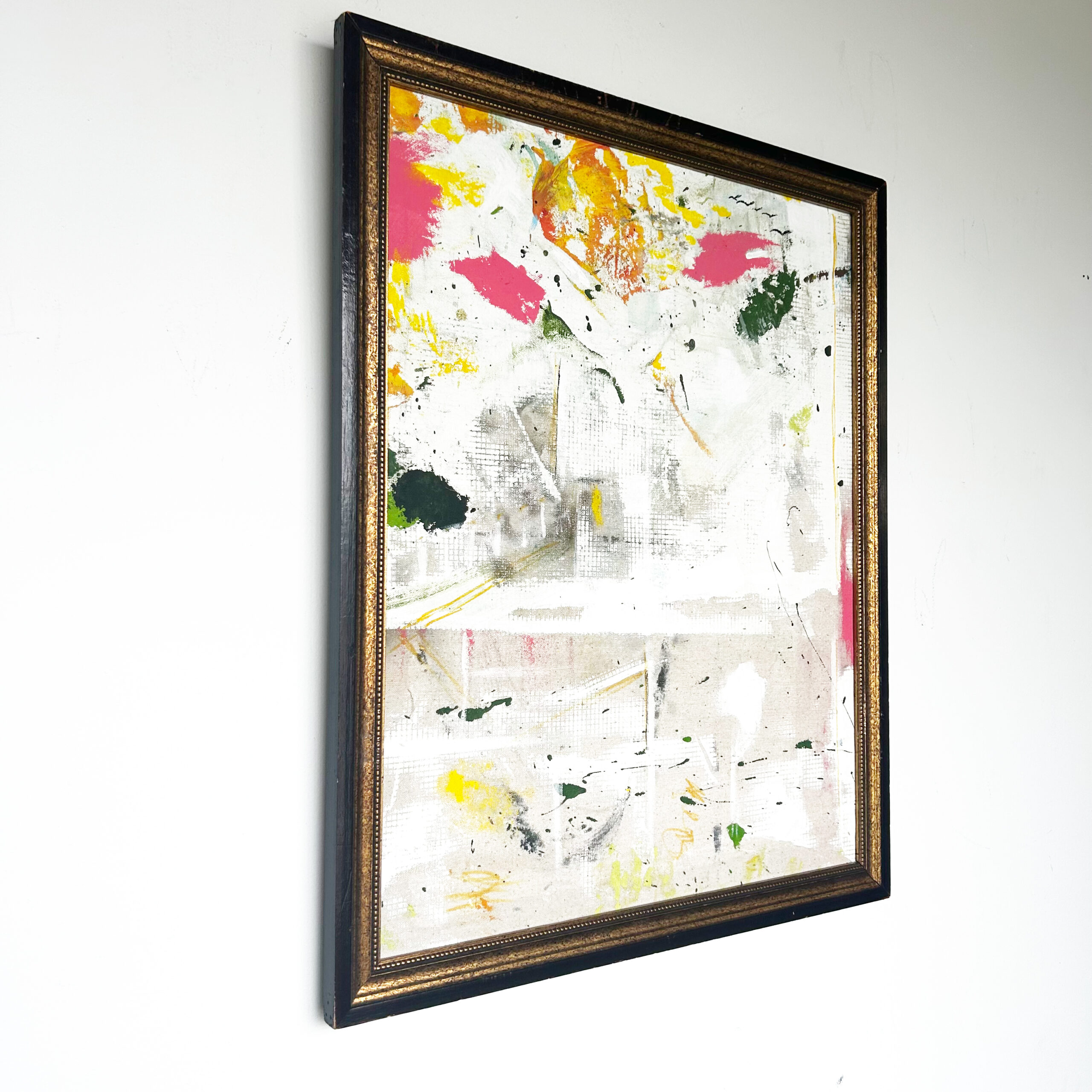 City on a Grid by Scott Kowalski, an abstract painting with white and gray grid textures and colorful accents, shown in a black and gold-tone frame.
