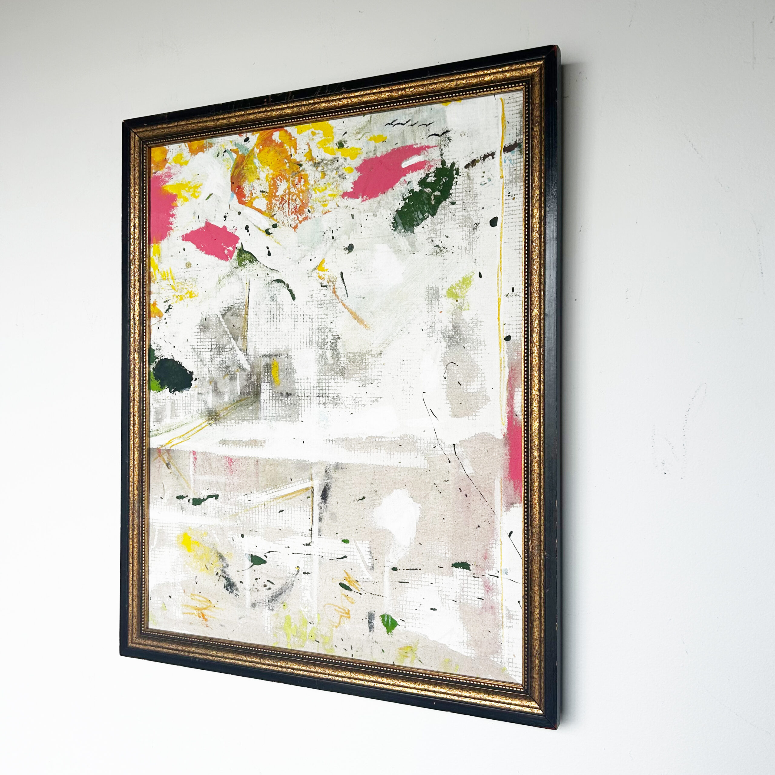 City on a Grid by Scott Kowalski, an abstract painting with white and gray grid textures and colorful accents, shown in a black and gold-tone frame.