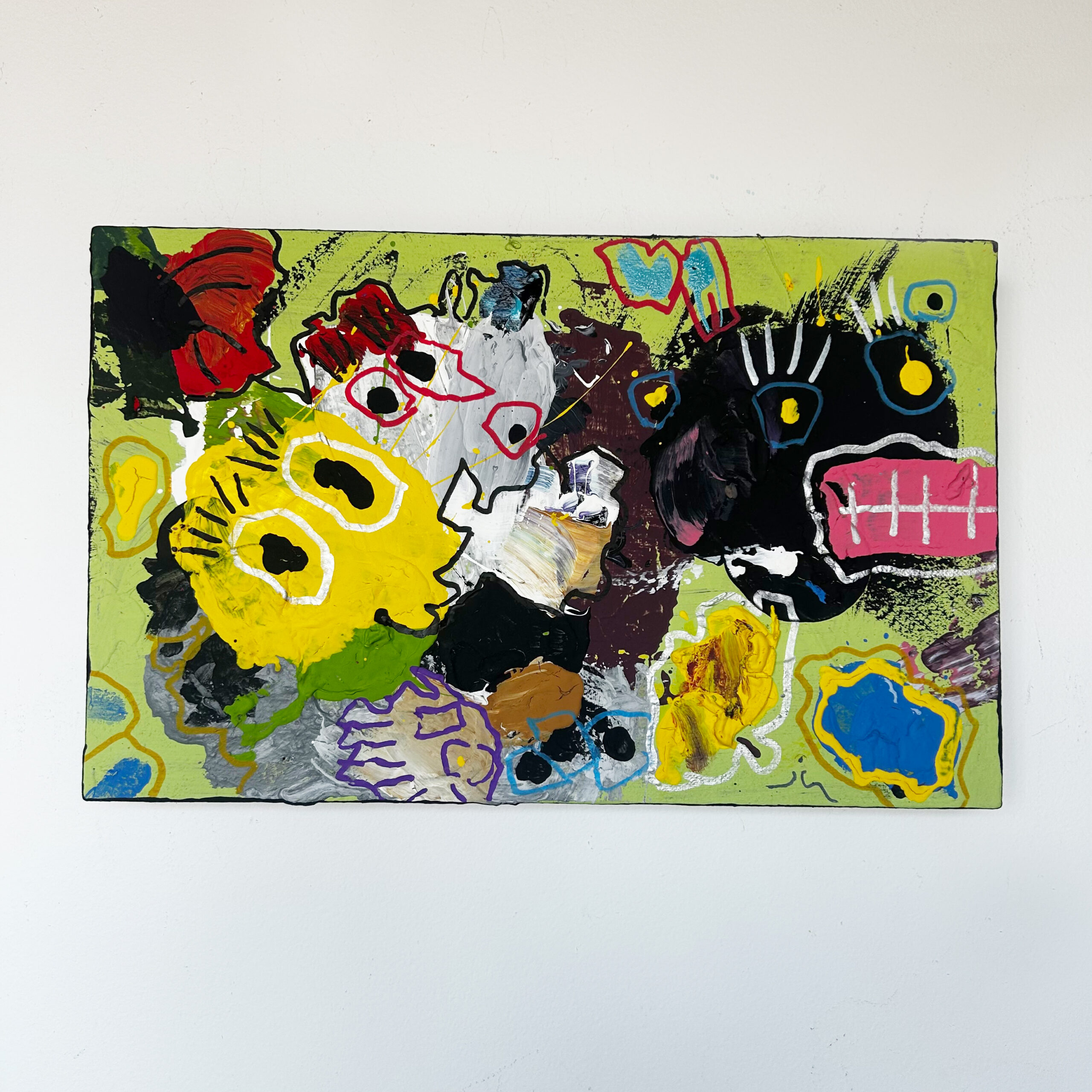 Little Giblets by Scott Kowalski: abstract monster faces in yellow, black, white, and pink against lime green, with blue and red accents.