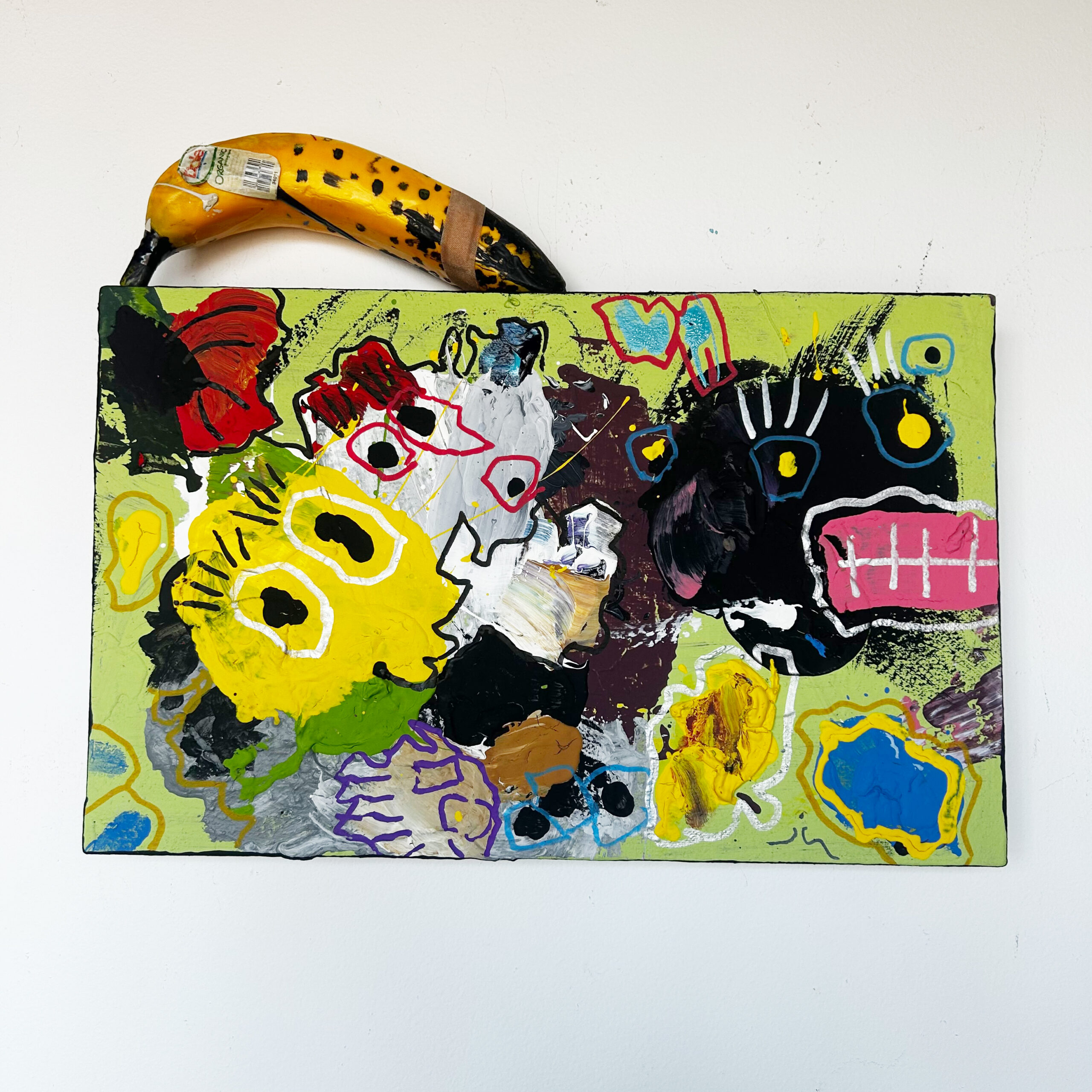Little Giblets by Scott Kowalski: abstract monster faces in yellow, black, white, and pink against lime green, with blue and red accents.